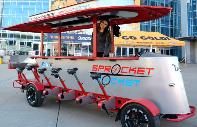 Nashville Pedal Tavern party bike with bachelorette group cruising Broadway