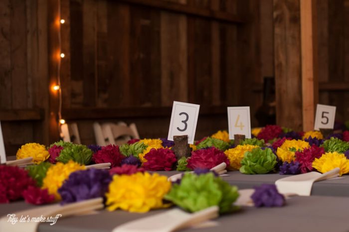 Tissue Paper Flower DIY: Learn how to make four different types of tissue paper flowers -- they can make a gorgeous wedding centerpiece without breaking the bank!